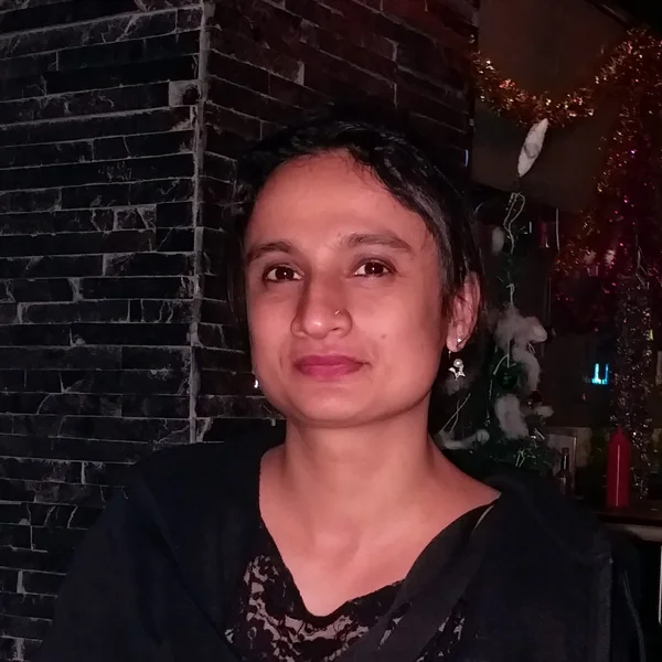 Dr. Neena S John